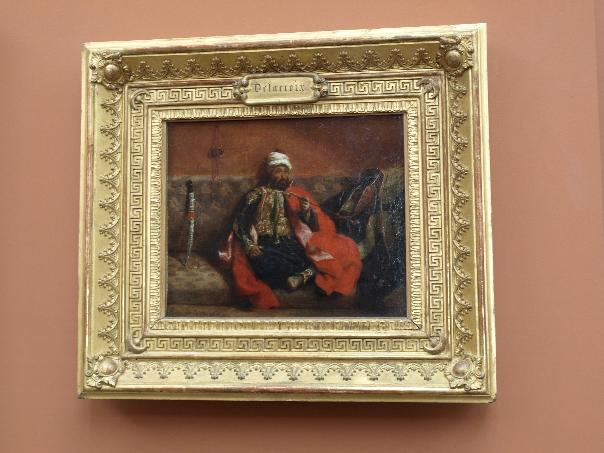Turc Fumant, Assis Sur un Divan by Eugene Delacroix